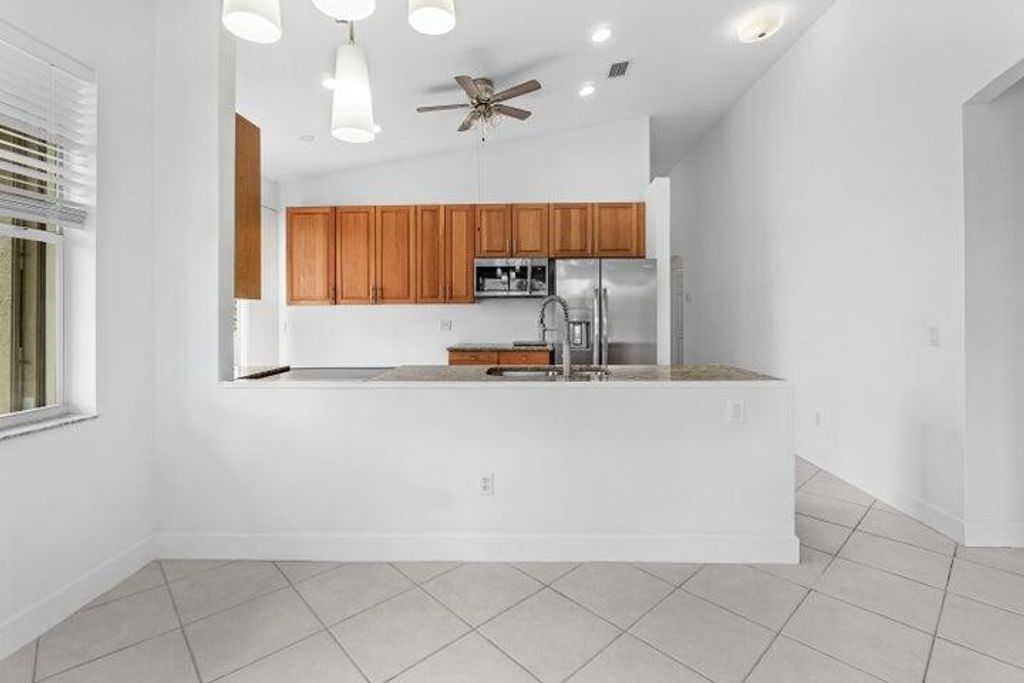 Photo of 8593 Mangrove Cay, West Palm Beach, FL 33411 (MLS # R11121157)