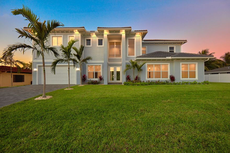 New construction only 5 years young! This beautiful waterfront home is only 3 lots to the Intracoastal Waterway with no fixed bridges to the Ocean. Meticulously maintained and outfitted to perfection by a critically acclaimed designer, the property offers plush furniture, unique lighting and graceful drapery along with plantation shutters throughout. Versatile floor plan with private elevator, first and second floor master suite options, den, flex space, open concept living and an outdoor space ideal for entertaining with views of the Intracoastal Waterway from the upper and lower levels. Bring your large boats and park right behind the house! No neighbors directly across the waterway. Elevator, 30lb boat lift and selling the home as is fully furnished. Bring your boat and your toothbrush!