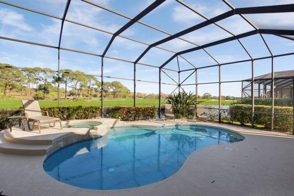 Photo of 8600 Tompson Point Road, Port Saint Lucie, FL 34986 (MLS # R10702968)