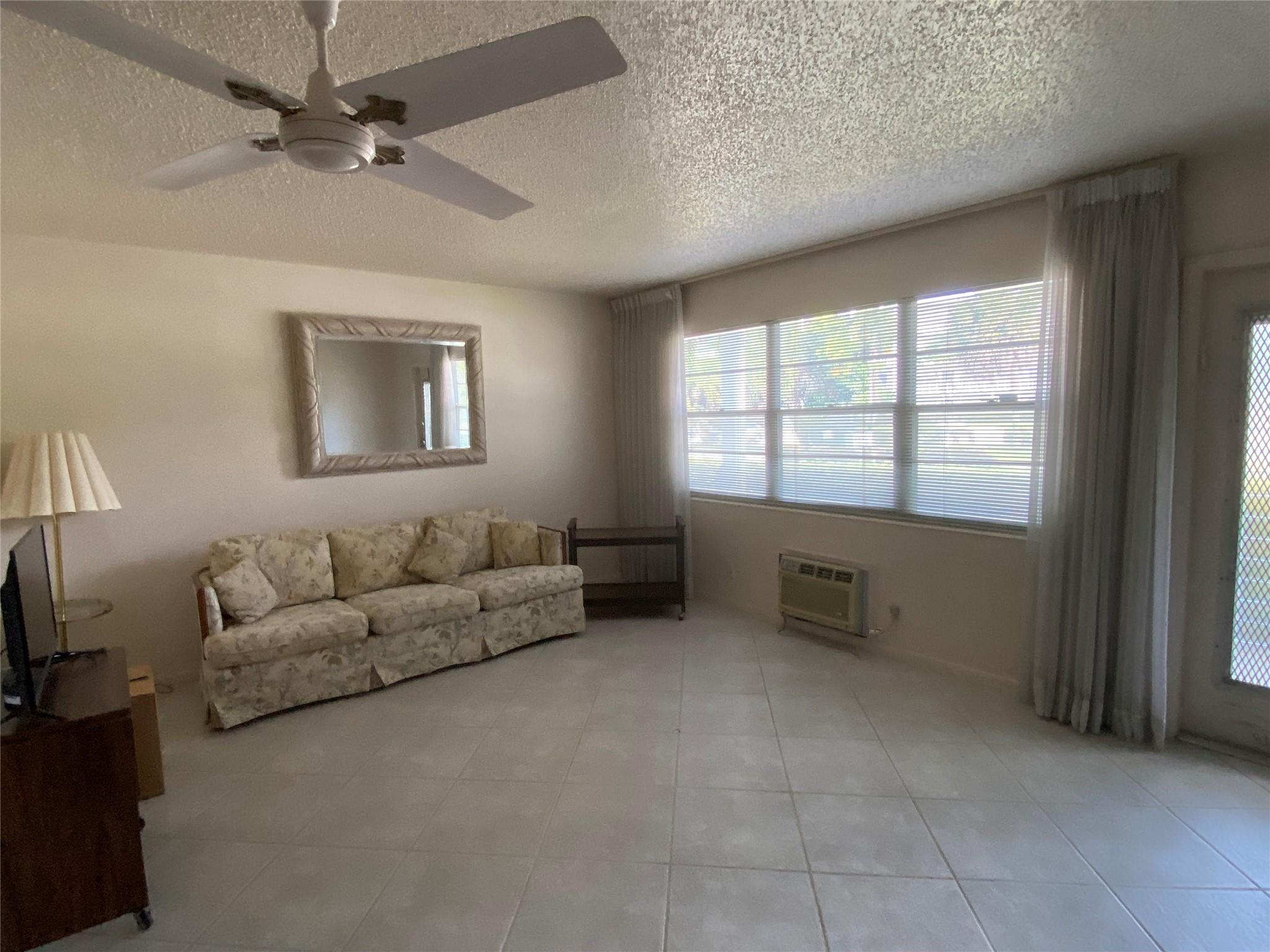Plan for your winter home now! First floor 1 bedroom 1.5 bath all tile unit with parking out front. This unit is all you need for the upcoming Winter months. Partially furnished, with new kitchen cabinets, all white appliances, dining area, and enclosed patio. Extra storage closet on tiled patio. Unit is a short walk to Century Plaza, Upminster and Richmond pools and Shuls. Clubhouse house has new zero entry pool, craft rooms, live theater shows, movie theater, Cafe on property. Shuttle service to malls, and grocery stores. This is a non-rental unit in a very well maintained building. Credit score 700 or better, monthly HOA's total $636.83, including water,sewer, trash, cable TV, & building reserve. Easy to show on showtime. Proof of funds must accompany all cash offers.