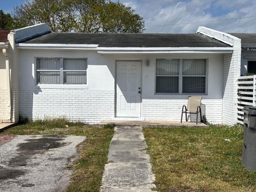 Are you looking for a fixer upper as an investor or first time homeowner who's handy?  Look no further....This 2/1 townhome with a shed needs some TLC to make it home.  Centrally located near the stadium, near highway, schools and shopping.  This will not last at this price.  Sale is subject to probate.