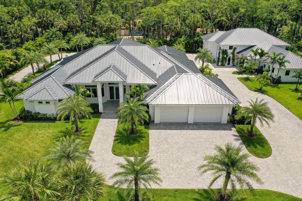 Photo of 15216 84th Avenue Ave N, Palm Beach Gardens, FL 33418 (MLS # R10798881)