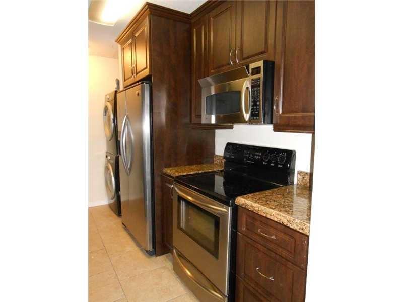 Beautifully updated 2-bedroom, 2-bathroom condo featuring upgraded bathrooms and a stylish kitchen with wood cabinets, granite countertops, and stainless steel appliances. The unit boasts 18x18 tile floors, a full-size upgraded washer and dryer, and a screened-in porch with serene views of the lake. The complex offers  amenities, including a clubhouse, business center, fitness center with a jacuzzi, volleyball court, running trail, pet-friendly areas, and barbecue grills with picnic tables overlooking the lake . Ideally located near shopping, dining, the Sawgrass Mall, and major roads.
