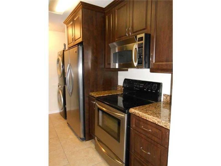 Beautifully updated 2-bedroom, 2-bathroom condo featuring upgraded bathrooms and a stylish kitchen with wood cabinets, granite countertops, and stainless steel appliances. The unit boasts 18x18 tile floors, a full-size upgraded washer and dryer, and a screened-in porch with serene views of the lake. The complex offers  amenities, including a clubhouse, business center, fitness center with a jacuzzi, volleyball court, running trail, pet-friendly areas, and barbecue grills with picnic tables overlooking the lake . Ideally located near shopping, dining, the Sawgrass Mall, and major roads.