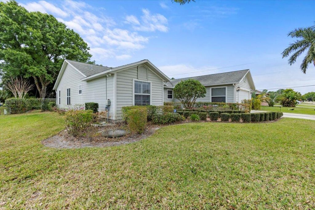 Photo of 2409 SW Lafayette Street, Port Saint Lucie, FL 34953 (MLS # R10966354)