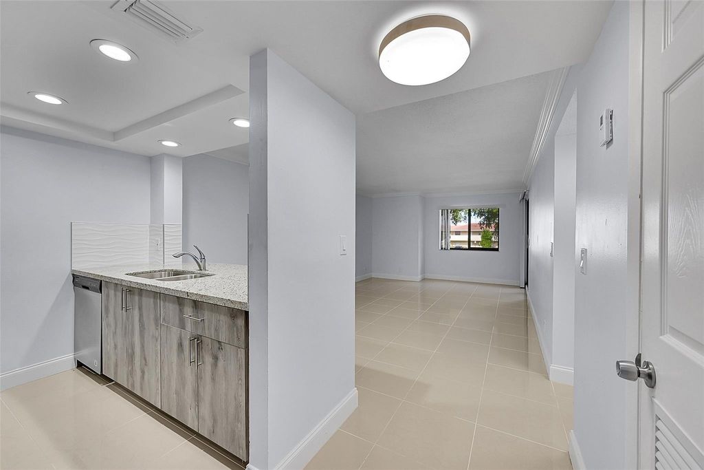 Photo of 10001 W Atlantic Boulevard #221, Coral Springs, FL 33071 (MLS # F10550068)