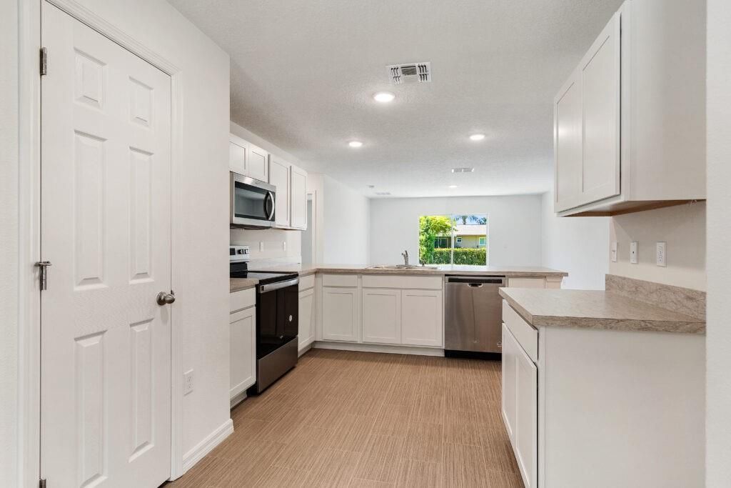 Photo of 2102 SE Holland St, Port Saint Lucie, FL 34952 (MLS # F10532431)