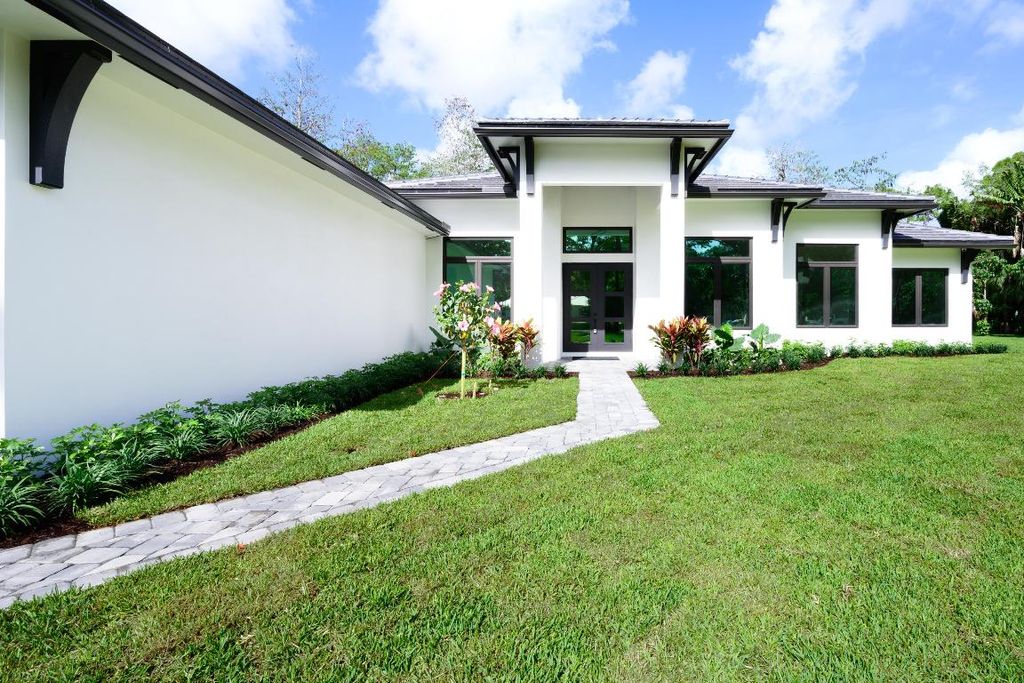 Photo of 11144 Monet Woods Road, Palm Beach Gardens, FL 33410 (MLS # R11113740)