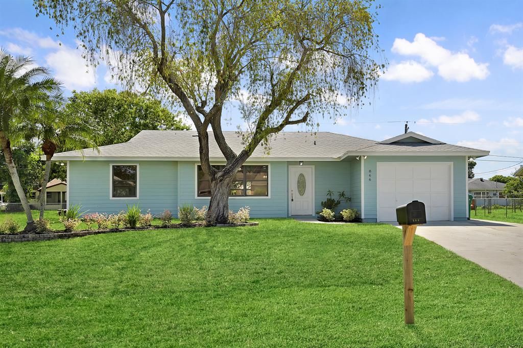 Photo of 866 SW Curry Street St, Port St Lucie, FL 34983 (MLS # R10818924)