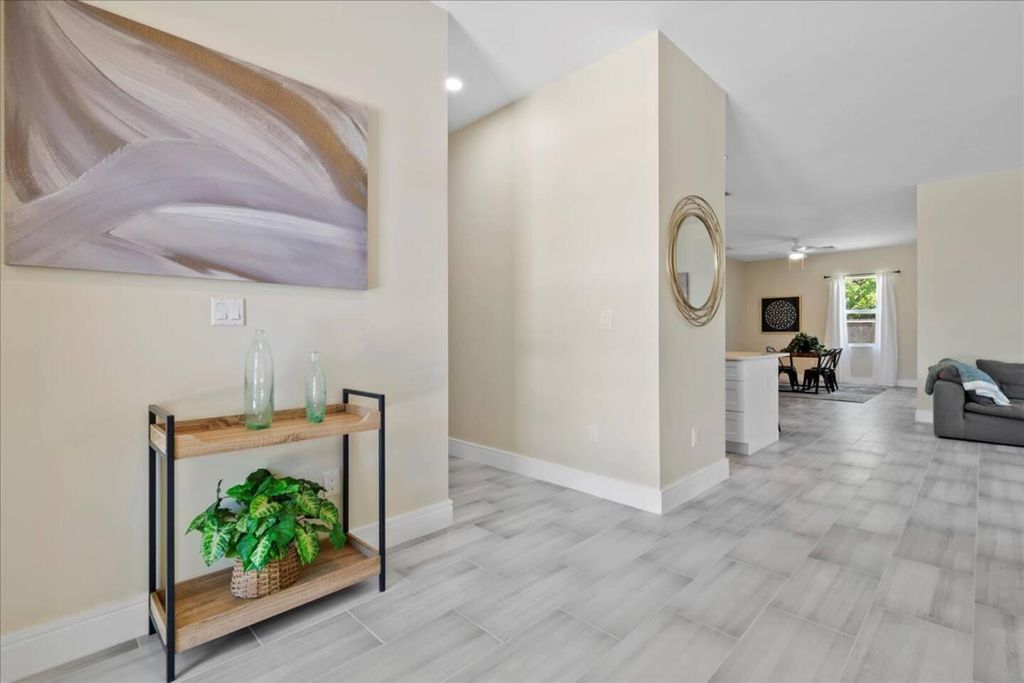 Photo of 818 Foresteria Drive, Lake Park, FL 33403 (MLS # R11043316)