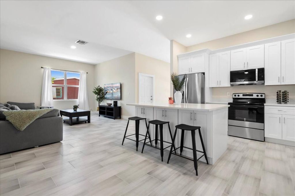 Photo of 818 Foresteria Drive, Lake Park, FL 33403 (MLS # R11043316)