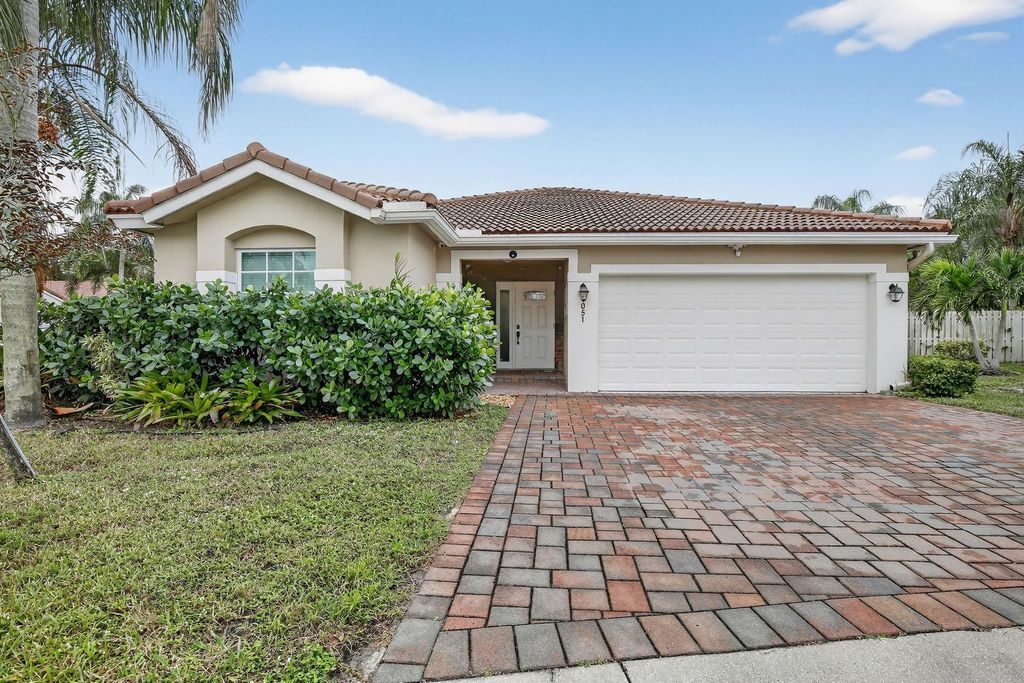 Photo of 1051 NW 124th Terrace, Sunrise, FL 33323 (MLS # F10555846)