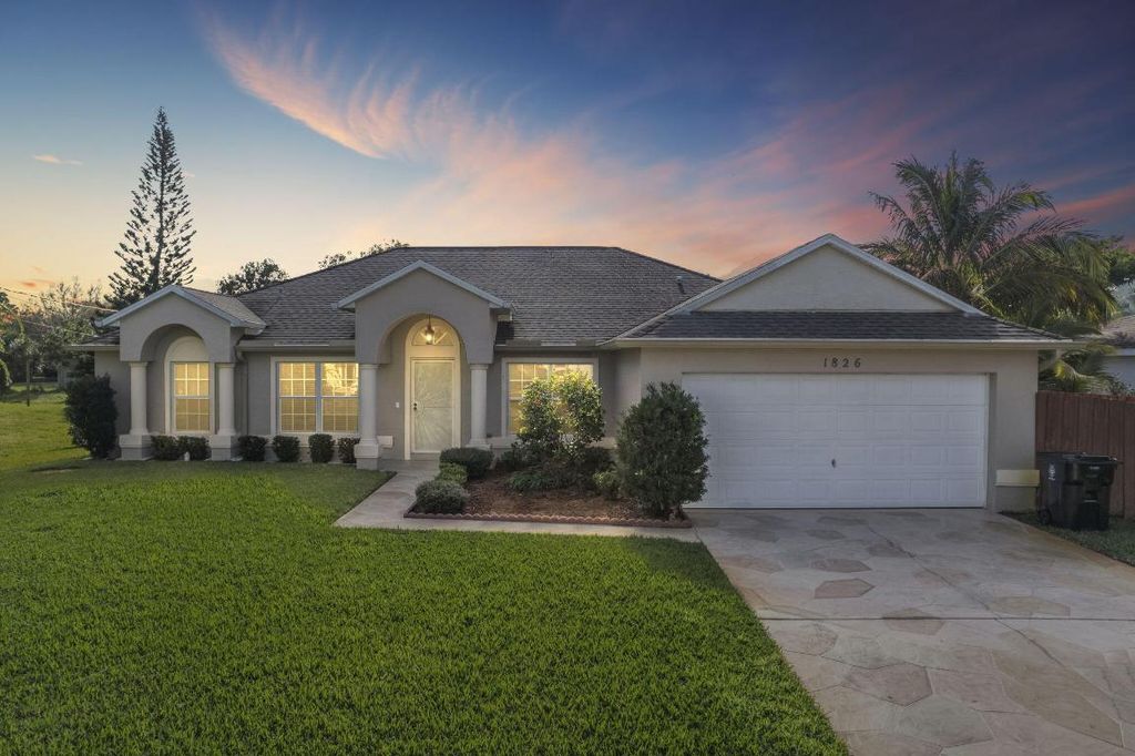 Photo of 1826 SE North Buttonwood Drive, Port Saint Lucie, FL 34952 (MLS # R10952975)