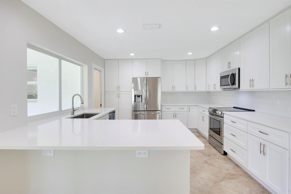 Photo of 8 Bannock Road, Palm Beach Gardens, FL 33418 (MLS # R11008470)
