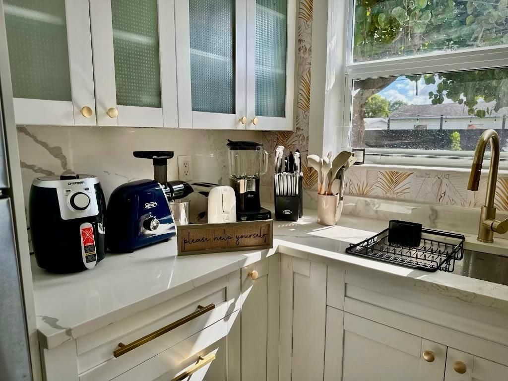 Photo of 5690 Honeysuckle Drive, West Palm Beach, FL 33415 (MLS # R11096040)