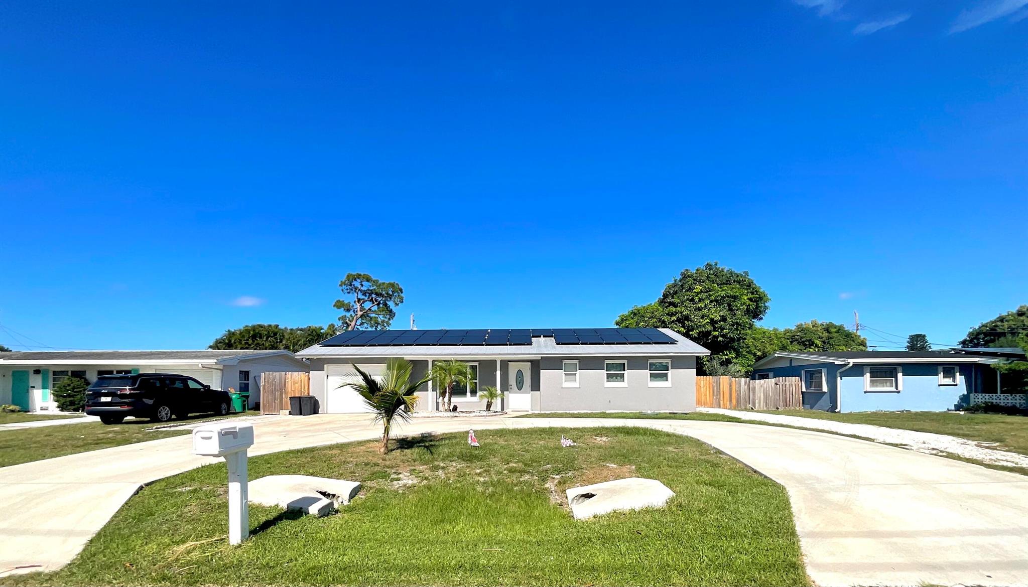 Price adjustment and seller will payoff solar panels! Located in beautiful River Park with county taxes only. This spectacular spacious home with 2 bedrooms, 2 baths, and a large den or flex room that can be easily converted into a bedroom. Sturdy metal roof installed in 2012 with energy saving solar panels. The sellers have added a beautiful circular driveway for easy access to the road and extra parking. You won't be disappointed with the grand outdoor living area with above ground pool and massive gorgeous pool deck ready for all of your entertaining needs. Fully fenced in yard and plenty of yard space for a boat, RV, or play area. Call me today to schedule your private showing.