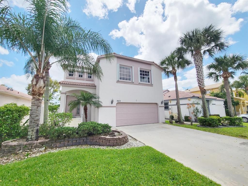Photo of 7672 Rockport Circle Cir, Lake Worth Beach, FL 33467 (MLS # R10793692)