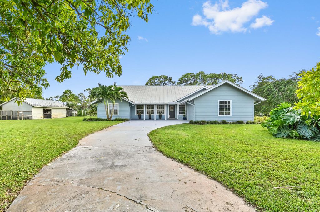 Photo of 14644 83rd Lane N, Loxahatchee, FL 33470 (MLS # R11029364)