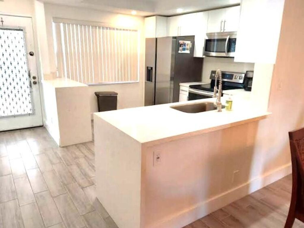 Photo of 2903 Victoria Circle, Coconut Creek, FL 33066 (MLS # B26005831)