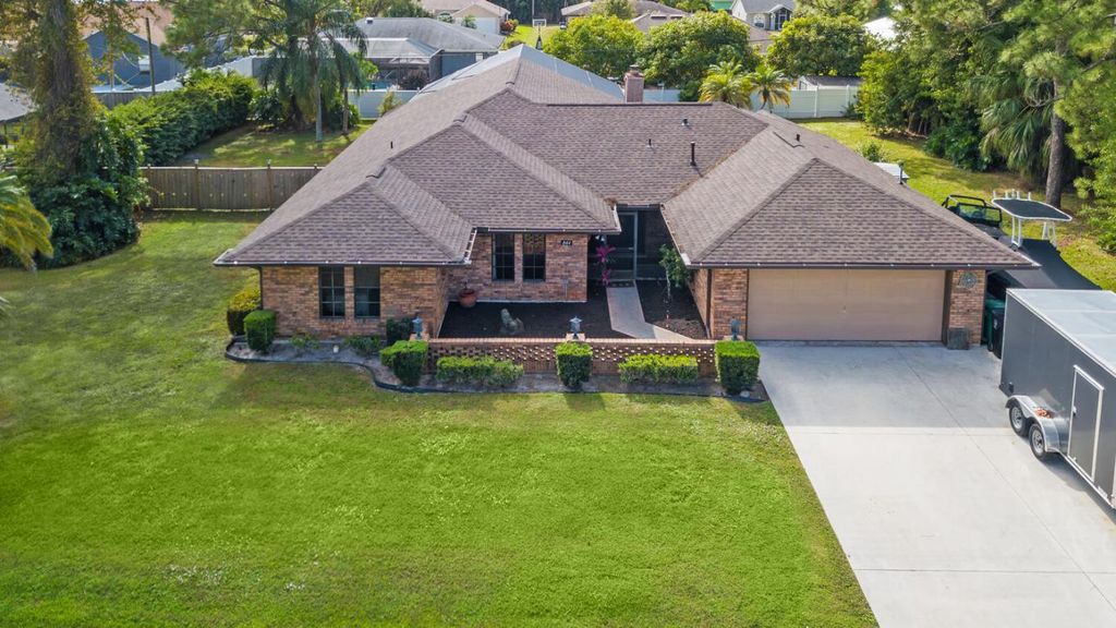 Photo of 844 SE Kendall Avenue, Port Saint Lucie, FL 34983 (MLS # R11145340)