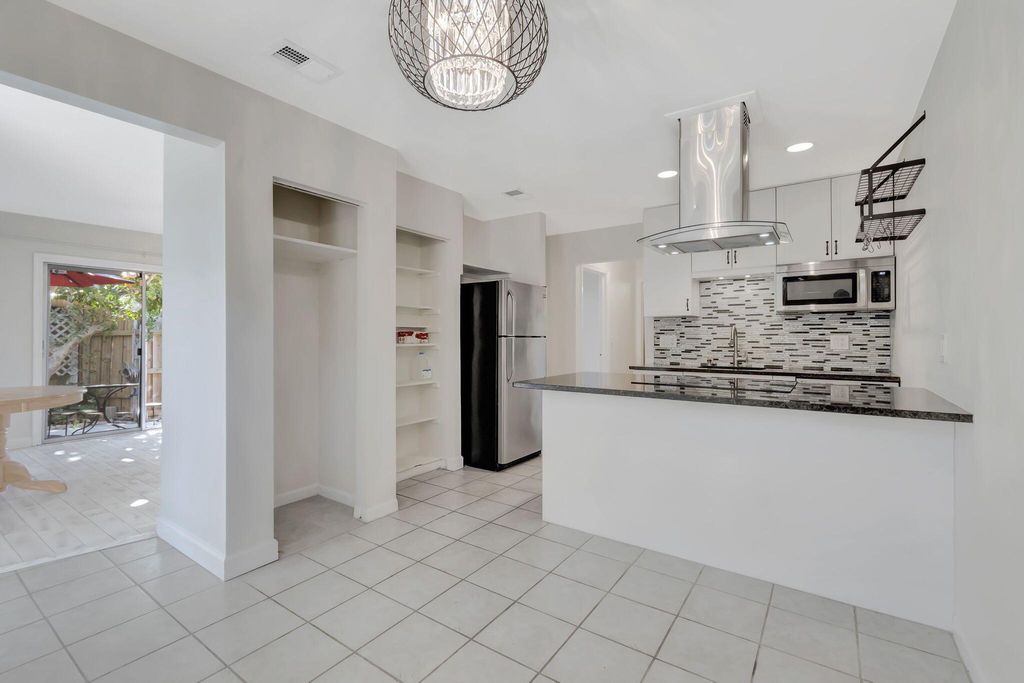 Photo of 309 NE 7th Avenue #B, Delray Beach, FL 33483 (MLS # R11126653)