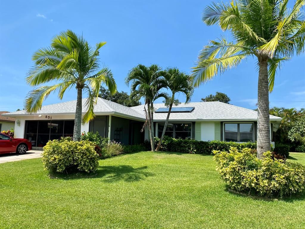 Photo of 851 SE Roulette Lane Ln, Port St Lucie, FL 34983 (MLS # R10811647)