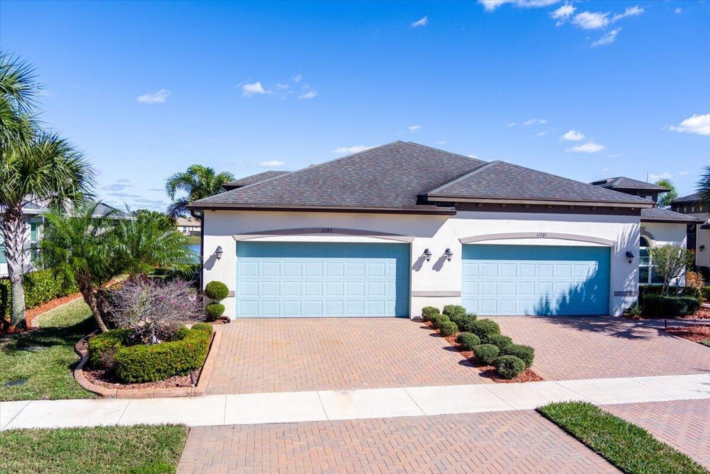 Photo of 11195 SW Parkside Drive, Port Saint Lucie, FL 34987 (MLS # R10954805)