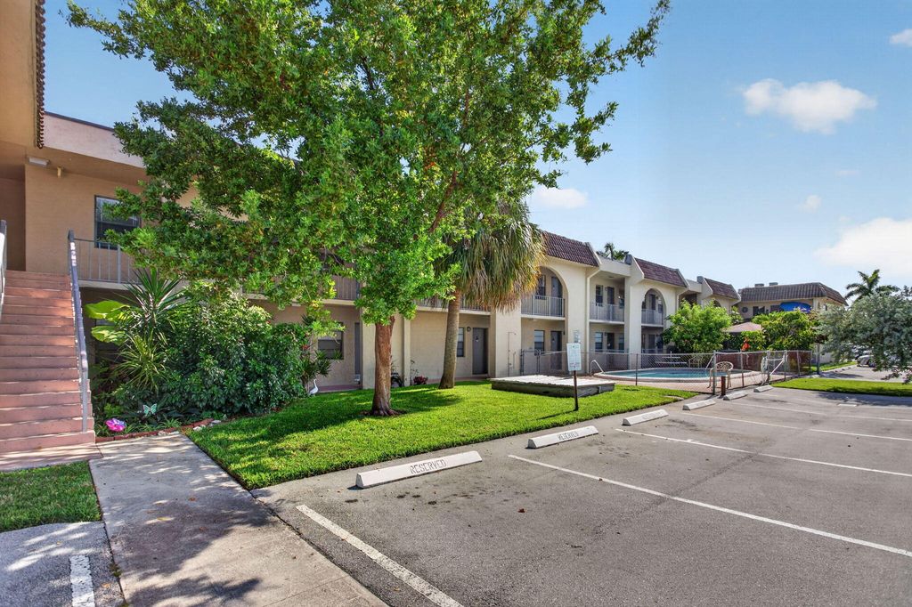 Photo of 2141 NE 42nd Street #204, Lighthouse Point, FL 33064 (MLS # B26045794)