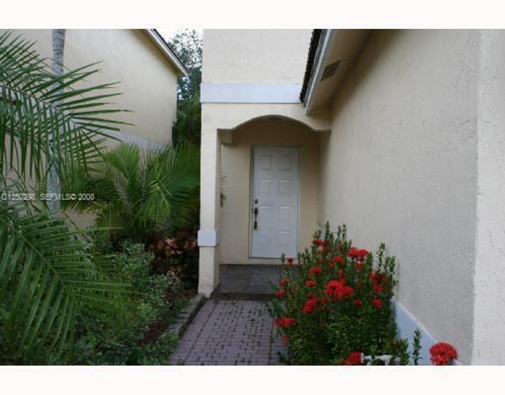 Photo of 9711 NW 2nd Street, Coral Springs, FL 33071 (MLS # B26012506)