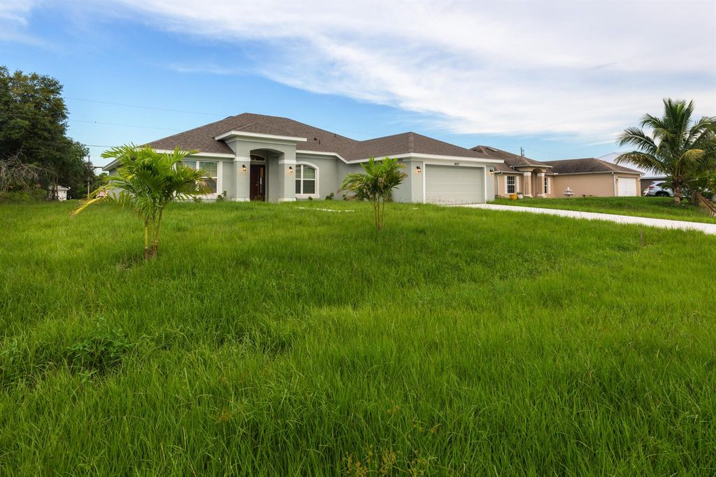 Photo of 4557 SW Van Dyke Street, Port St Lucie, FL 34953 (MLS # R10911658)