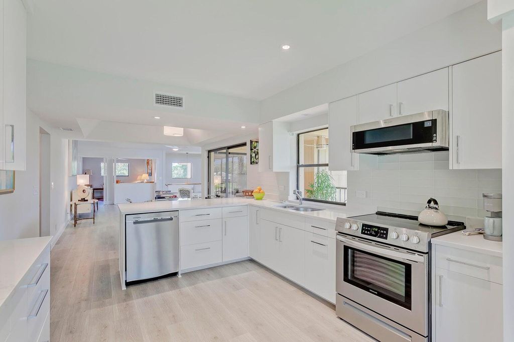 Photo of 17053 Waterbend Drive #231, Jupiter, FL 33477 (MLS # R11023913)