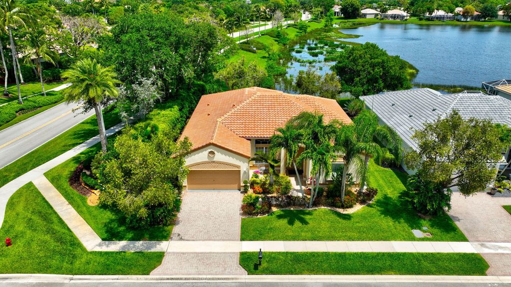 Photo of 9725 Asti Lane, Lake Worth, FL 33467 (MLS # B26025639)