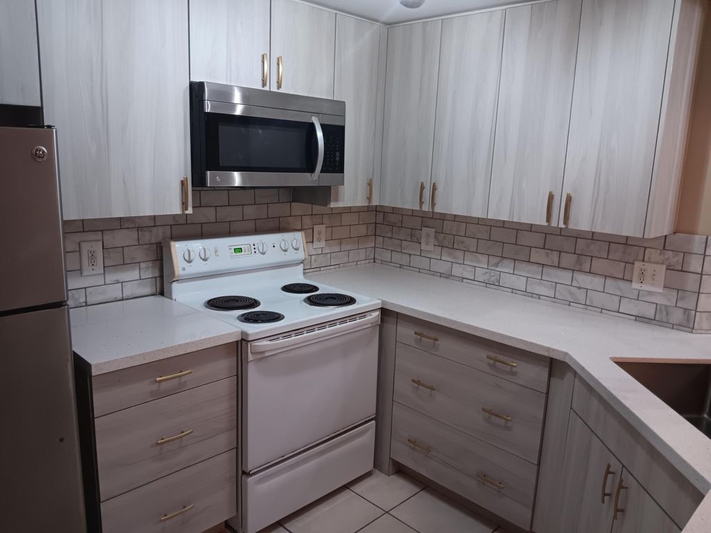 Photo of 5048 Lantana Road #5112, Lake Worth, FL 33463 (MLS # R11078088)