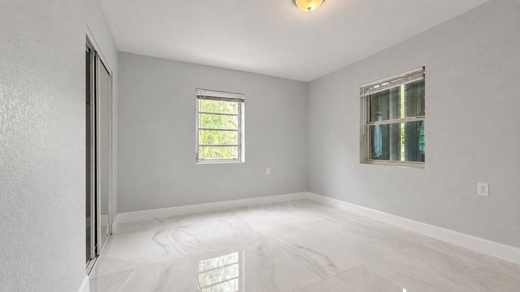 Photo of 4894 Cyprus Lane, Haverhill, FL 33417 (MLS # B26039092)