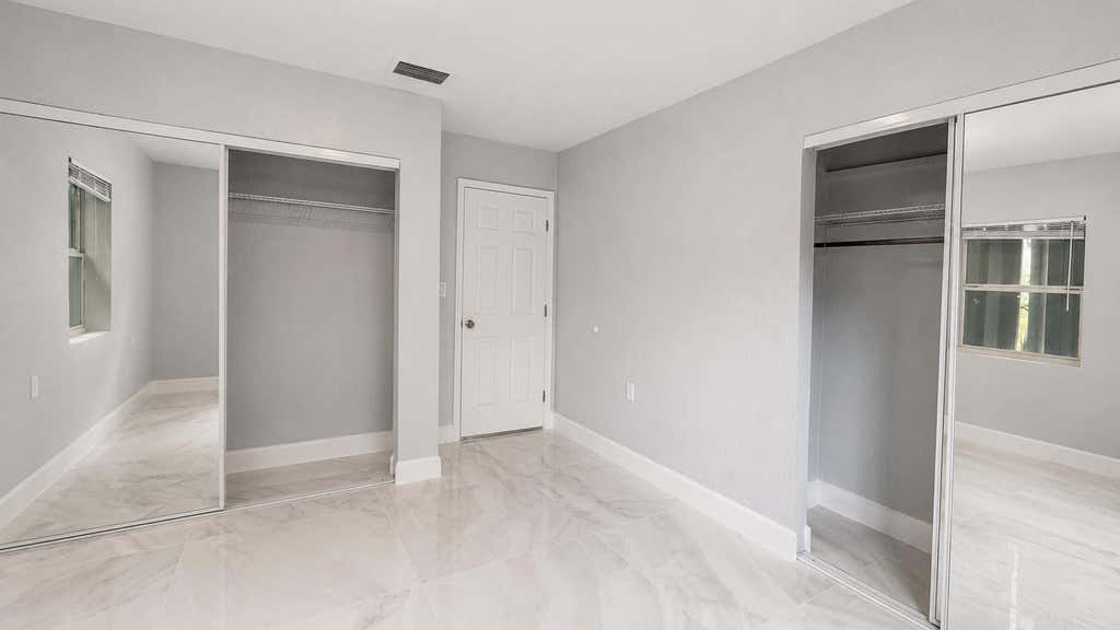 Photo of 4894 Cyprus Lane, Haverhill, FL 33417 (MLS # B26039092)