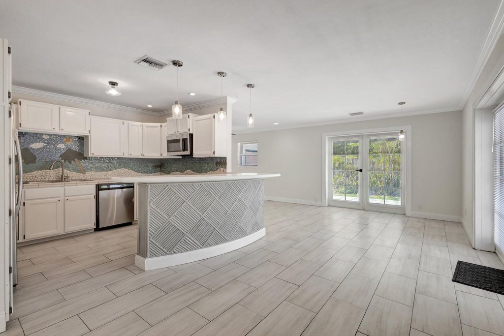 Photo of 1225 16th Ave N #B, Lake Worth Beach, FL 33460 (MLS # R11067378)