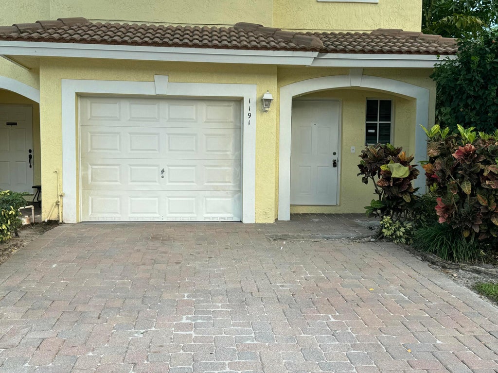Photo of 1191 Imperial Lake Road, West Palm Beach, FL 33413 (MLS # B26047797)
