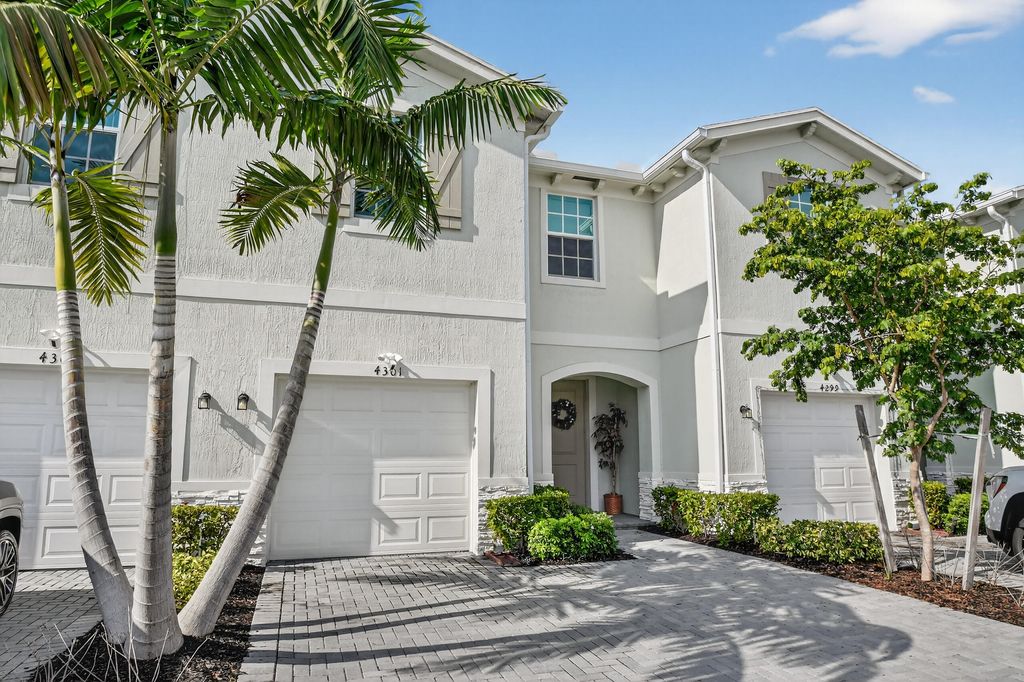 Photo of 4301 Hammock Grove Drive, Lake Worth, FL 33467 (MLS # R11149664)