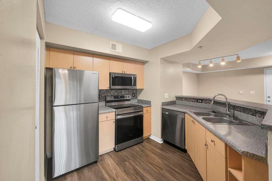 1BR/1BA Corner Unit - Portofino at Jensen Beach AVAILABLE FOR RENT. Beautiful CORNER condo just 5 minutes to the beach and close to shopping, dining, and entertainment. Features include NEWLY UPDATED BATHROOM, wood floors throughout, fresh paint, stainless steel appliances, fully equipped kitchen with washer/dryer, and lake views. Community amenities: clubhouse, pool, hot tub, fitness center, tennis, and squash courts. NO PETS. First, last, and security required. Application approval necessary. Available NOW.