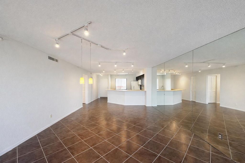 Photo of 2205 S Cypress Bend Drive #908, Pompano Beach, FL 33069 (MLS # B26007137)