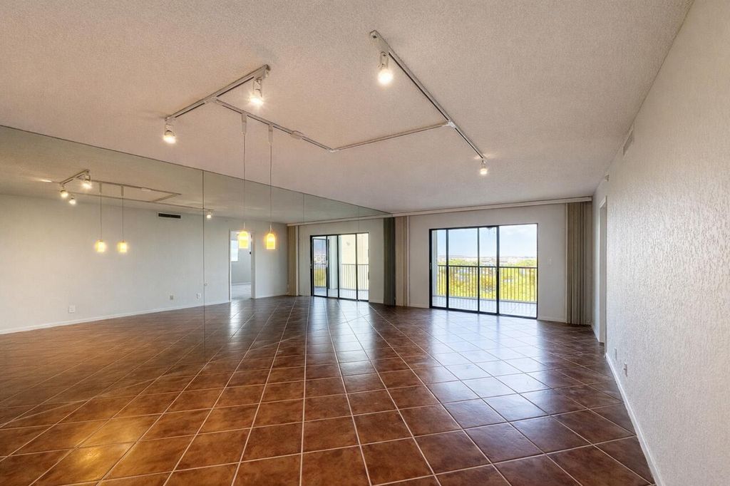 Photo of 2205 S Cypress Bend Drive #908, Pompano Beach, FL 33069 (MLS # B26007137)