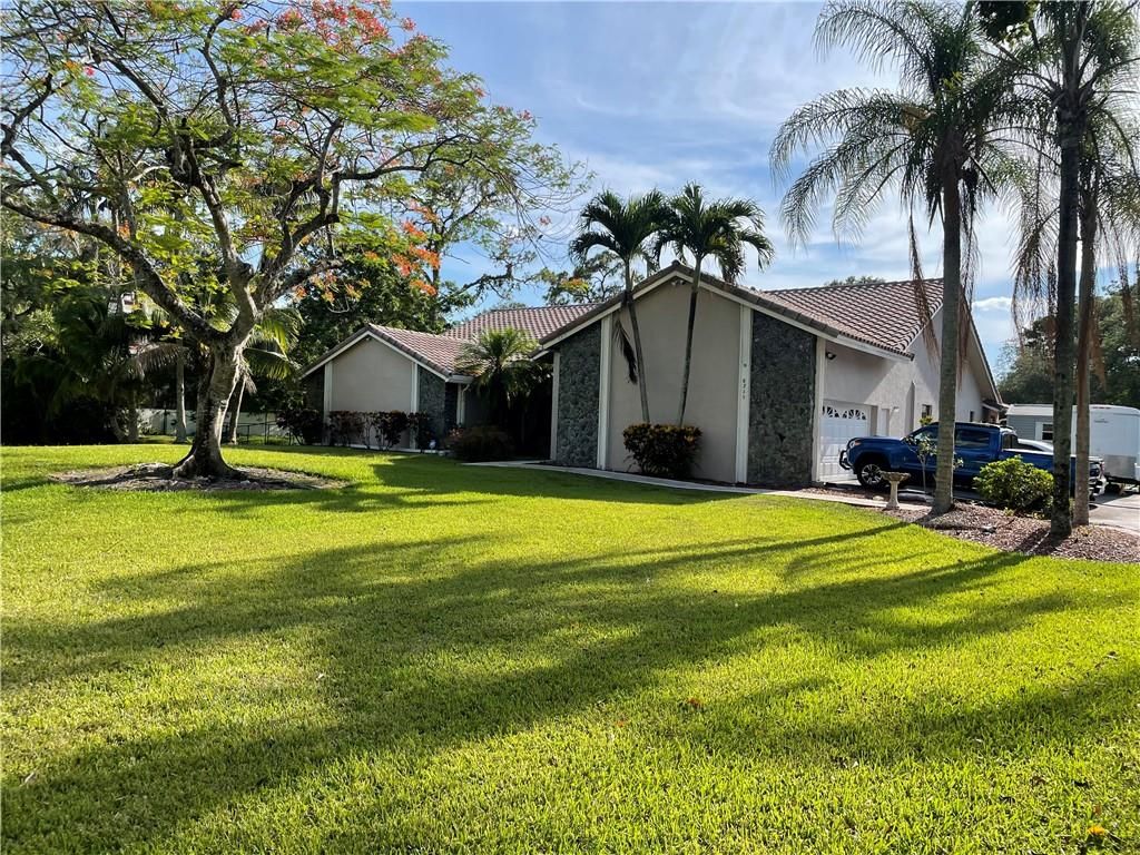 Photo of 6215 NW 80th Ter, Parkland, FL 33067 (MLS # F10284113)