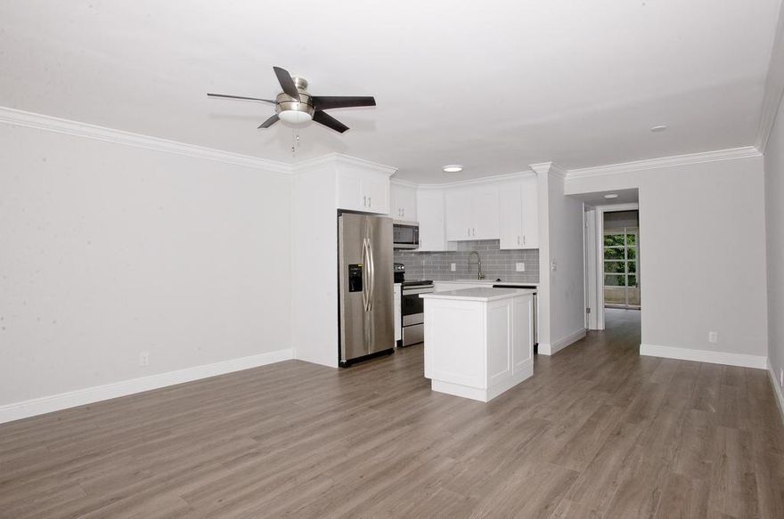 PRICE REDUCED! MOTIVATED SELLER READY TO MAKE A DEAL! BEAUTIFULLY PUT TOGETHER MODERN UNIT IN THE HEART OF DEERFIELD BEACH. THE UNIT BOASTS UPDATED BRAND NEW KITCHEN WITH QUARTZ  COUNTER TOPS, STAINLESS STEEL APPLIANCES AND A KITCHEN ISLAND. WOOD LAMINATE FLOORS IN LIVING ROOM, DINNING AND KITCHEN. TILED WALK IN SHOWER WITH CUSTOM GLASS DOOR. THE COMMUNITY OFFERS MANY AMENITIES AND ACTIVITIES, CLOSE TO MAJOR HIGHWAYS, SHOPPING, RESTAURANTS AND MINUTES WAY FROM THE BEACH.  MOTIVATED SELLER!