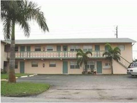 Photo of 270 NE 40th Street NE #26, Oakland Park, FL 33334 (MLS # B26041493)