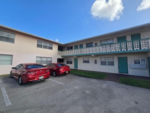 Photo of 270 NE 40th Street NE #26, Oakland Park, FL 33334 (MLS # B26041493)
