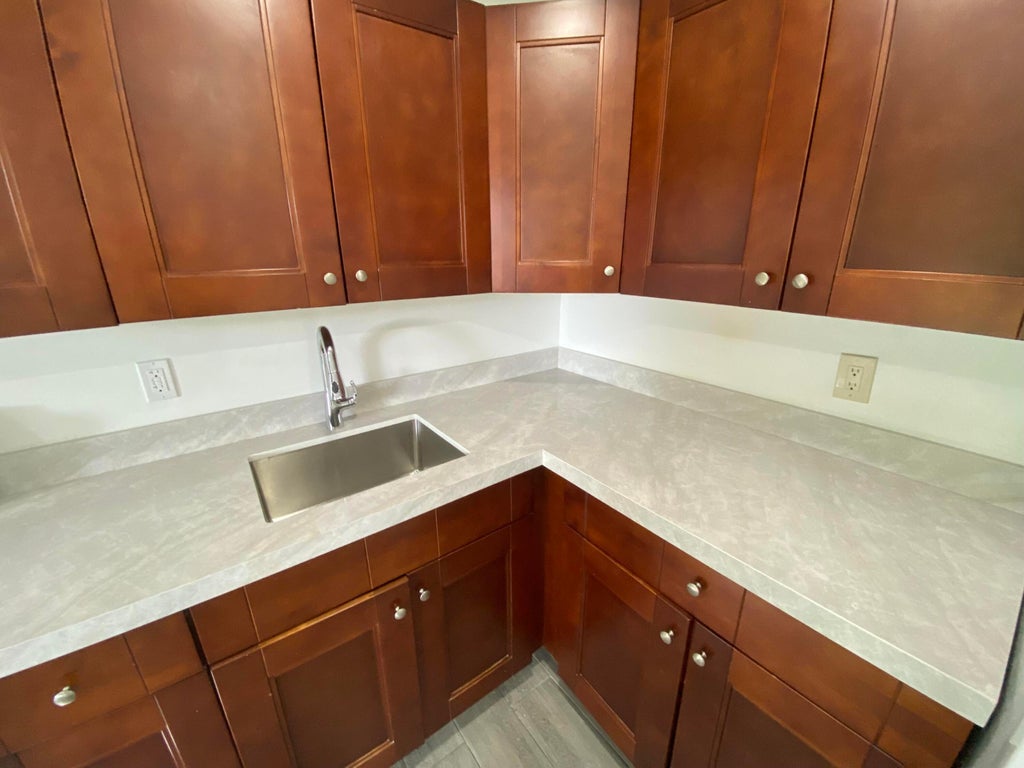 Photo of 850 SW 9th Avenue #1-4,  C, Hallandale Beach, FL 33009 (MLS # B26064535)
