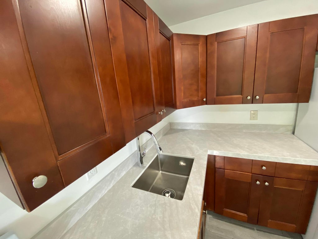 Photo of 850 SW 9th Avenue #1-4,  C, Hallandale Beach, FL 33009 (MLS # B26064535)