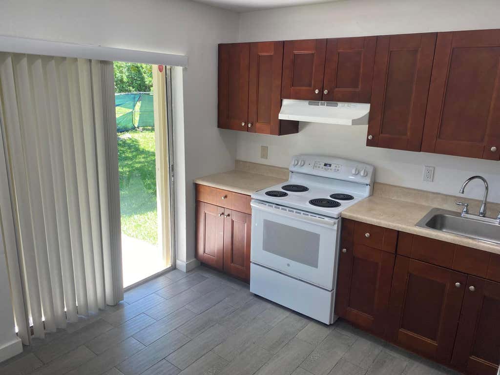 Photo of 850 SW 9th Avenue #1-4,  C, Hallandale Beach, FL 33009 (MLS # B26064535)