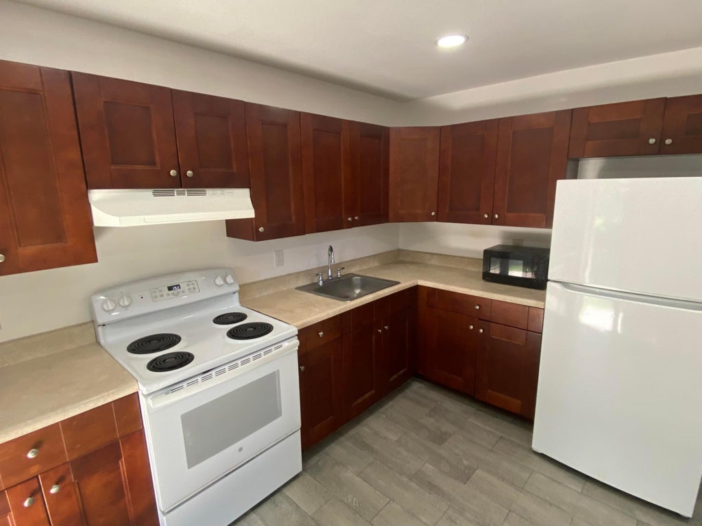 Photo of 850 SW 9th Avenue #1-4,  C, Hallandale Beach, FL 33009 (MLS # B26064535)