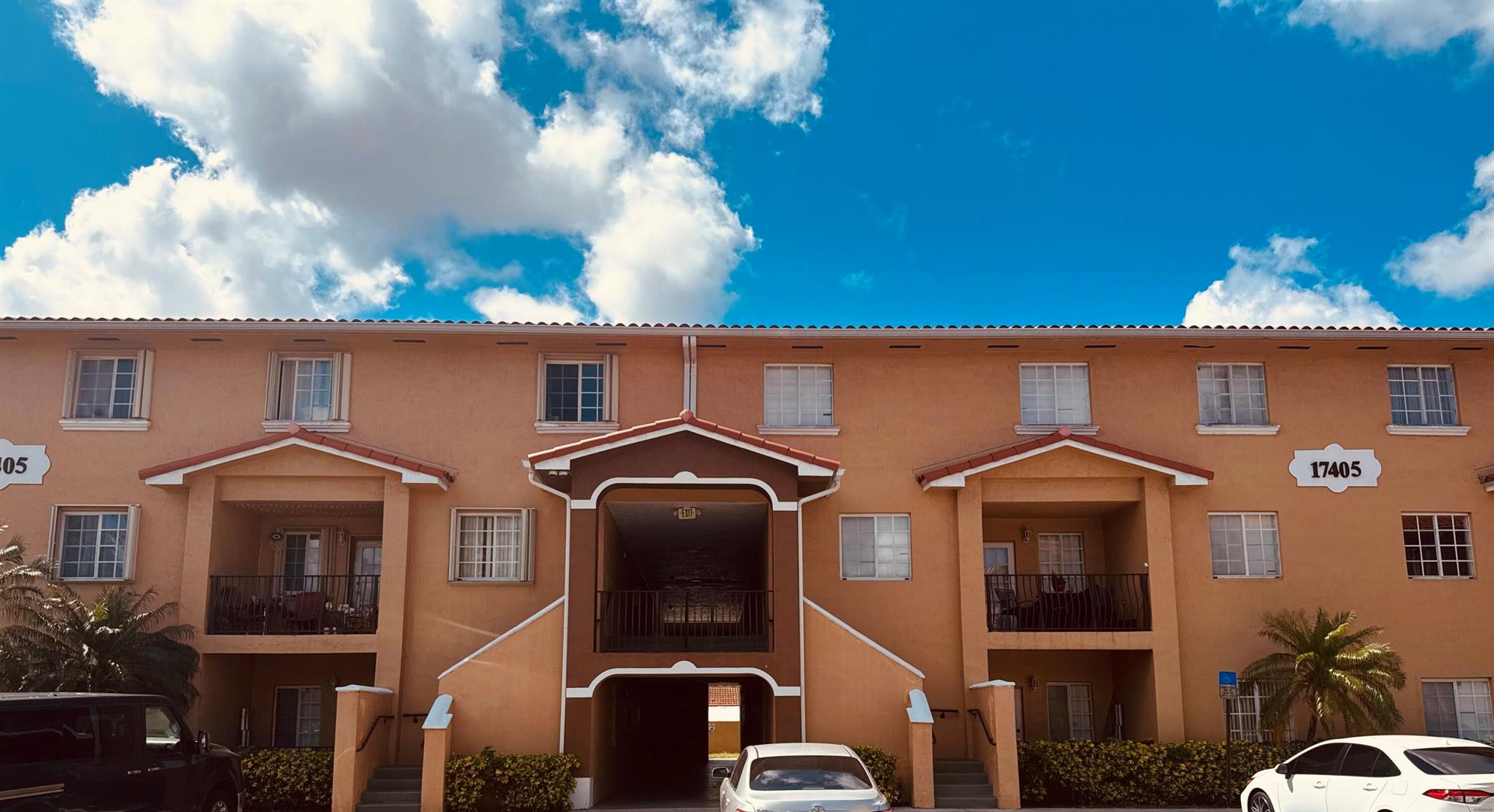 Discover this spacious 3-bedroom, 2-bathroom ground-floor condominium in the sought-after Poinciana Lakes Villas community. Built in 2000, this 1,220 sq ft unit offers a well-designed layout featuring tiled living areas and laminate flooring in the bedrooms. The large master suite includes an en-suite bathroom, while the second bathroom provides dual access from both the hallway and the second bedroom. The kitchen is equipped with ample cabinet space and a full-size washer and dryer. Enjoy the convenience of two assigned parking spaces located near the unit and a small private patio. Situated close to top-rated schools, shopping centers, and major highways, this home offers both comfort and accessibility.